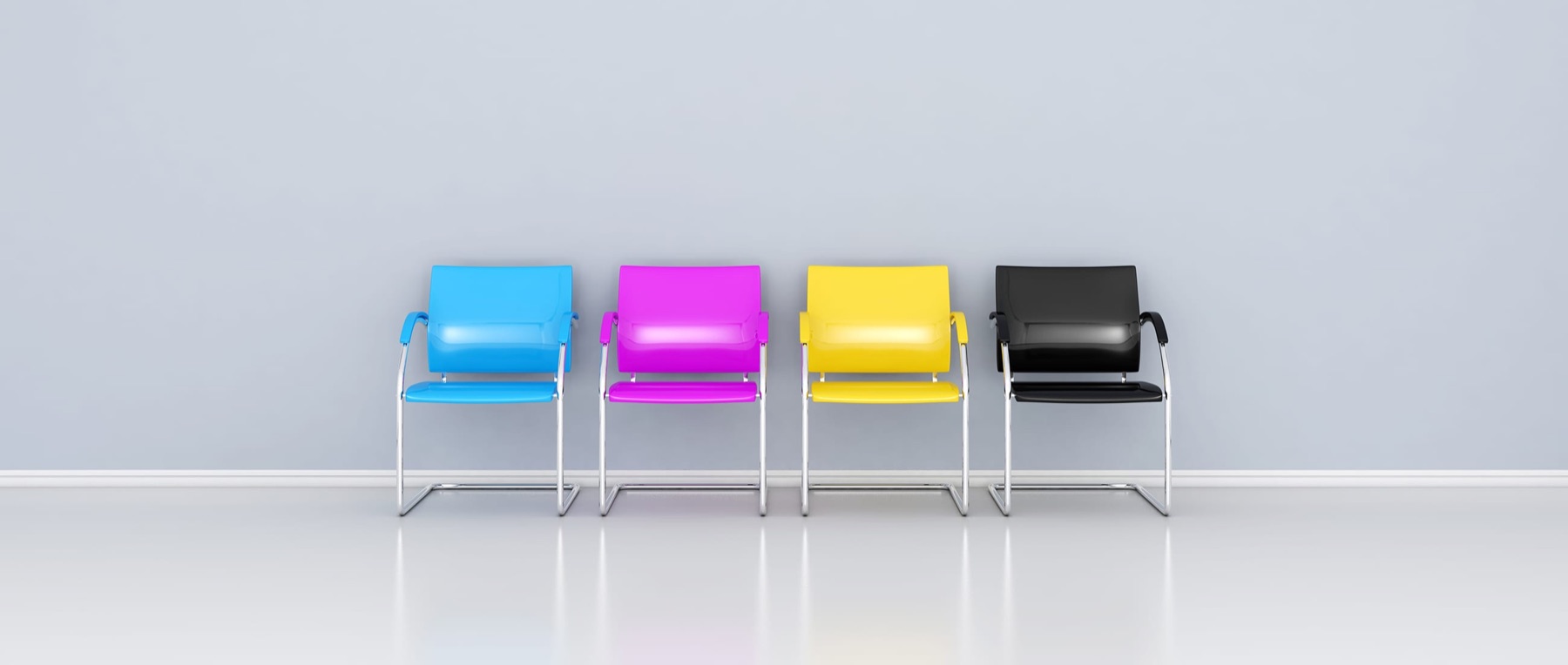 Four chairs in cyan, magenta, yellow and black — the CMYK colours of print